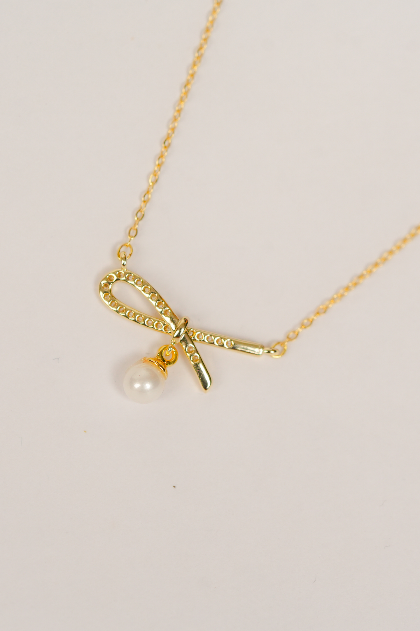Minimalist Gold-Plated Bow & Pearl Pendant